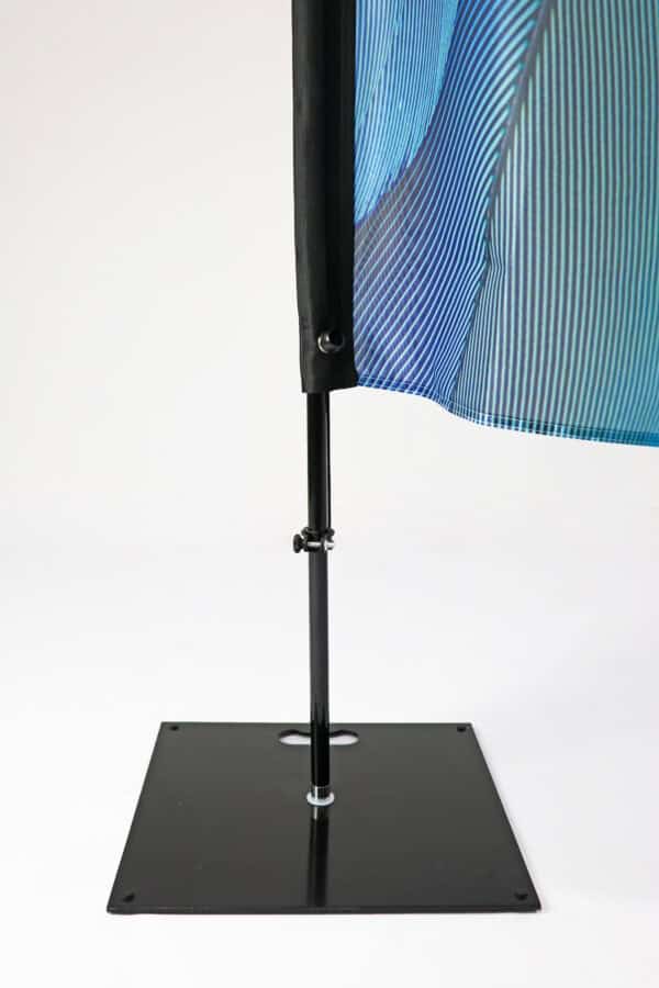 Feather flag stand with base for outdoor advertising displays.